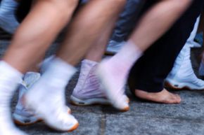 Is it crazy to jog around barefoot? Some runners don't think so.
