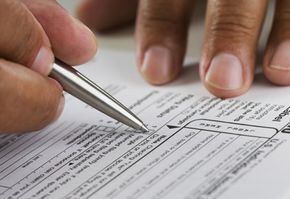 filling out a tax form