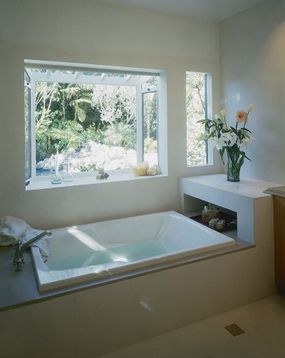The sun-bathed tub offers personal luxury.