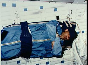 astronauts training to use bathroom