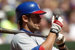 Nomar Garciaparra adjusting his batting gloves