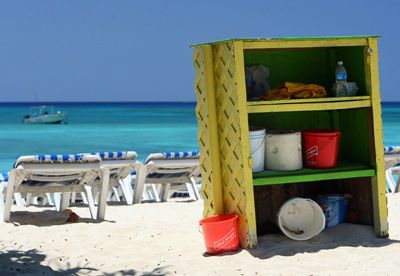 Beach buckets on Seven Mile Beach in Grand Cayman, Cayman Islands.