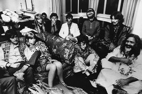 Yoga Image Gallery The Beatles give an audience to the Maharishi Mahesh Yogi in September 1967. From left to right: Paul McCartney, Jane Asher, Pattie Boyd, Ringo Starr, his wife Maureen, John Lennon, George Harrison and Maharishi Mahesh Yogi. See more yoga pictures.