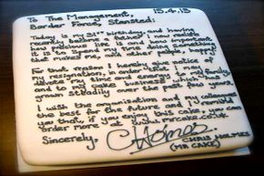 Chris Holmes presented his resignation in a tasty way -- via a carrot cake iced with his &quot;goodbye&quot; letter.