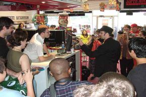 Doug Walker (right), as his alter ego Nostalgia Critic, takes on James Rolfe (the Angry Video Game Nerd) at a video game store in New Jersey.