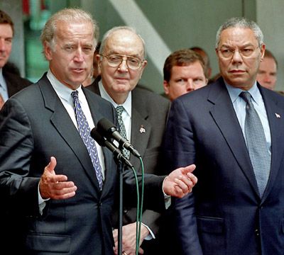 joe biden, jesse helms, and colin powell meeting with reporters