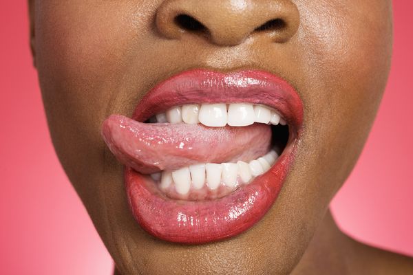 A woman sticking her tongue out.