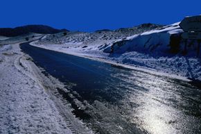 Precipitation on wintry road