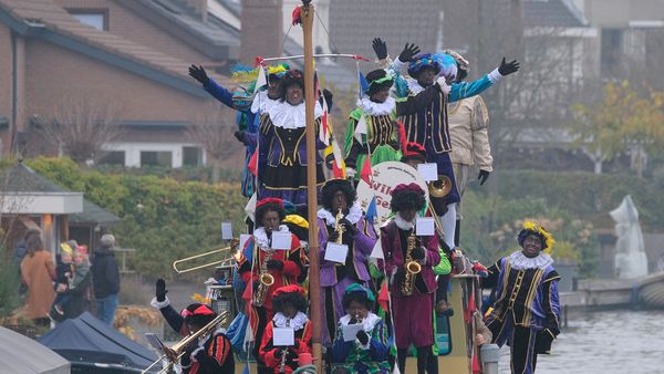 Zwarte Piet, Black Peter arriving by boat