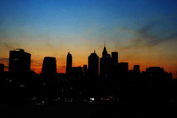The sun sets over the Manhattan skyline Aug. 14, 2003, during a major power outage.