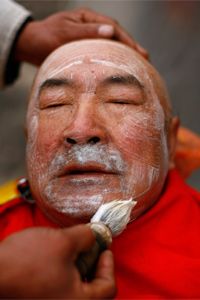 Guy getting shave