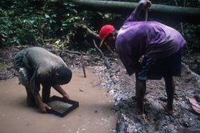 Miners search for diamonds near Kisangani, Democratic Republic of the Congo.
