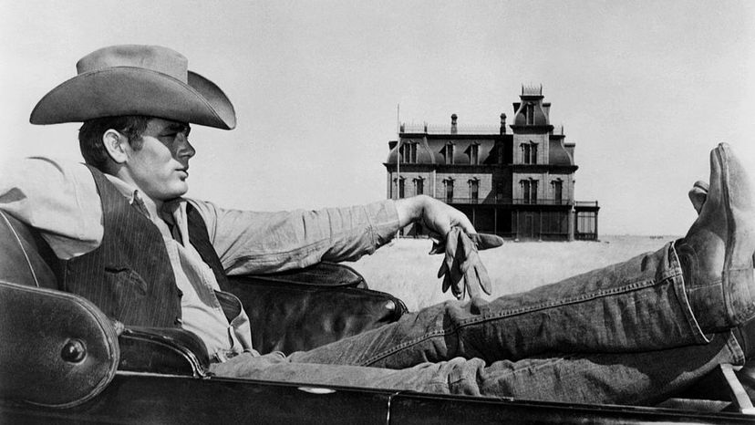Actor James Dean poses for a photo on the set of the Warner Bros film 'Giant' in 1955 in Marfa, Texas. Dean helped to popularize jeans with teens in the 1950s. Michael Ochs Archives/Getty Images