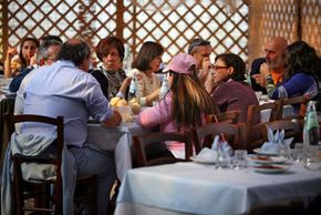 A fish farm in Sardinia, Italy, where diners enjoy a midday meal on a Sunday, has been in the same location since the fifteenth century.