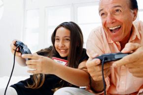 Image Gallery: Parenting Technology doesn't have to be isolating. Gaming with your kid is a guaranteed good time! See more parenting pictures.