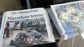 Front page of Boston Globe with marathon bombing headline