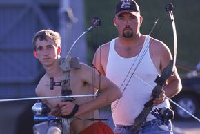 These two are about to start bowfishing for carp with their compound bows and arrows at the base of the Gavin Point Dam on the Missouri River.