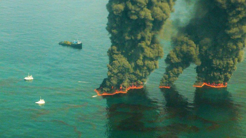 Smoke rises from a controlled burn May 19, 2010, in the Gulf of Mexico after the oil spill, which occurred April 20. John Kepsimelis/U.S. Coast Guard/Getty Images