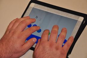 How do touch-screen monitors know where you're touching