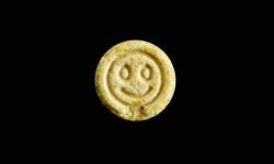Not so smiley, Ecstasy -- you might not cause holes in the brain, but that doesn't mean you're good for it.
