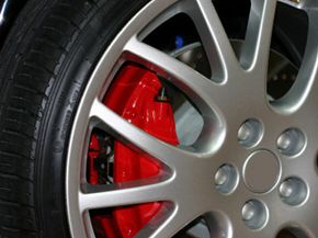 Brake calipers on the wheel of a high performance vehicle.