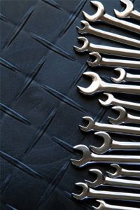 A good set of wrenches is essential for most basic brake line repair.­
