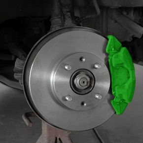The brake pads are housed in a car's brake system.