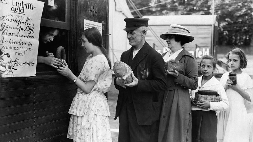 people exchange bread, jam etc for circus tickets, Germany