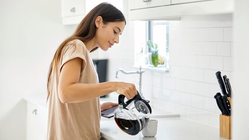 woman making coffee