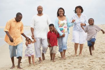 Outdoors family with daughter and adult.