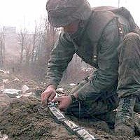 A U.S. Army officer plants 14 pounds of C-4 explosive on a command bunker in Bosnia-Herzegovina.
