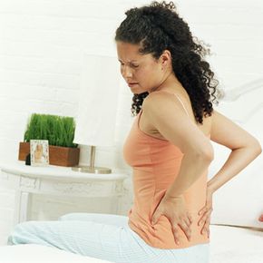 Waking up with back pain? It could be work-related.
