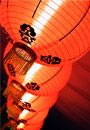Lanterns illuminating a Japanese celebration.