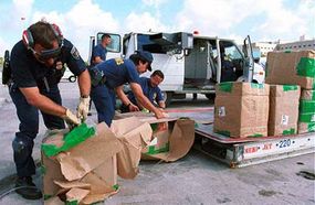 U.S. Customs inspectors check bulk shipments entering the United States.