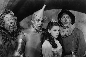 Bert Lahr as the Cowardly Lion, Jack Haley as the Tin Man, Judy Garland as Dorothy Gale and Ray Bolger as the Scarecrow in a scene from the 1939 classic film &quot;The Wizard of Oz.&quot;