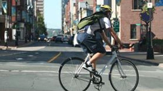 Cycling Tip of the Week: How to Change Lanes and Make Left Turns