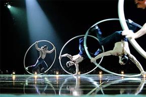 Artists perform solos and group figures on Cyr wheels during the Belgian premiere of the Cirque du Soleil show 'Corteo' in 2012.