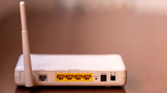 Which is better to use for a cable modem -- a USB connection or an Ethernet card?