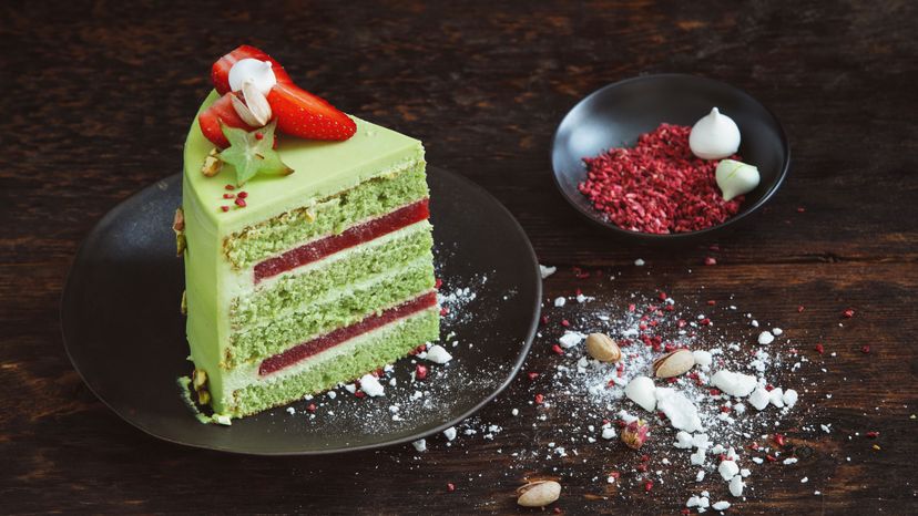 This lovely pistachio sponge cake has a strawberry filling. Sponge cakes use egg whites, rather than baking powder, as leavening agents. Eugene Mymrin/Getty Images