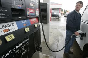 A customer fills up his car at a Speedway gas station in Columbus, Ohio.