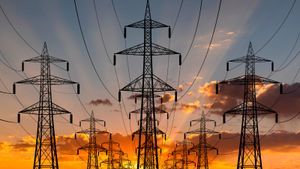 power lines on a sunset setting