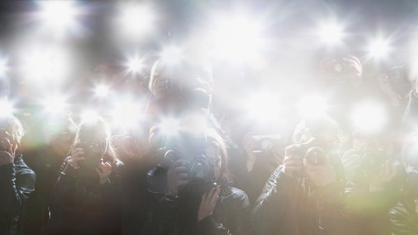Multiple camera flashes by paparazzi cameras