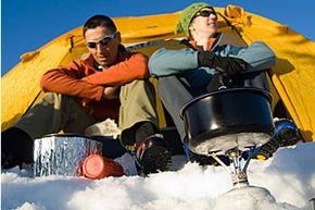 Two men camping in the snow