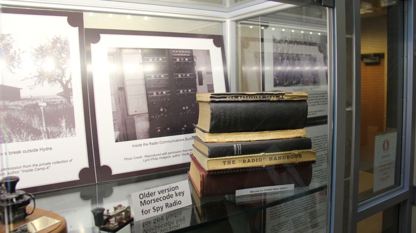 An exhibition of Camp X memorabilia features pictures of the radio communications building and manuals for Hydra. © 2012 Robert Bell/CC BY 2.0