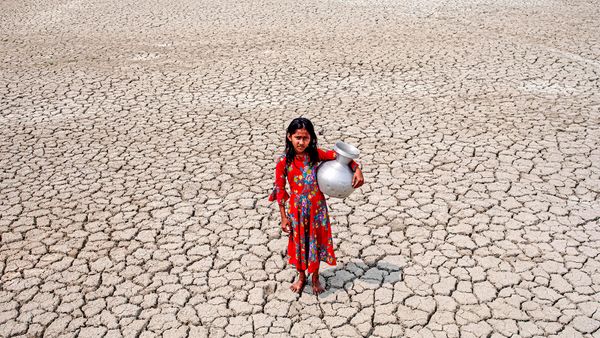 Women alone in nature's outdoor sand.