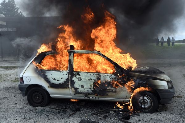 Could this fire have been caused by a bullet hitting the car's fuel tank? (Probably not.)