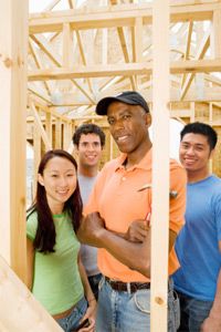 Group at home construction community service project, portrait