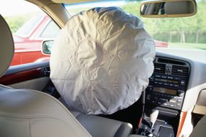inflated air bag inside of car