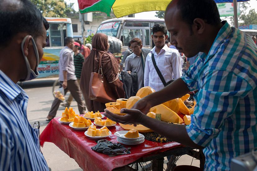 A vendor sells food on the street in Dhaka, Bangladesh, on Oct. 15, 2016. Most food sold on street corners in developing nations may not be safe for tourists to eat.  Zakir Hossain Chowdhury/NurPhoto via Getty Images