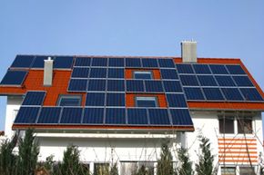Coating your roof with solar panels may allow you to get off the power grid or sell electricity back to it.